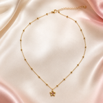 Collier enfant Petite Fleur rose en acier inoxydable doré
