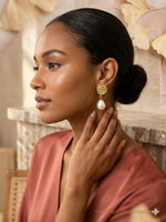 Boucles d'Oreilles Spirales Dorées et Perles Gouttes  Élégance Vintage