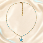 Collier Étoile de mer turquoise en acier inoxydable doré
